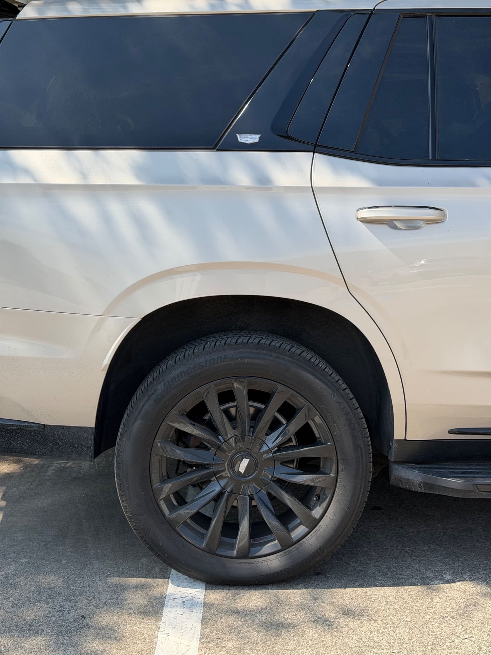 Cadillac Escalade wheel coated in brake dust